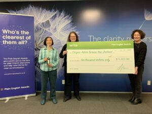 Violet Chong and Sacha Green from Citizens Advice Bureau receive giant winner's cheque from sponsor Write Limited's Deputy Chief Executive Anne-Marie Chisnall (2021)